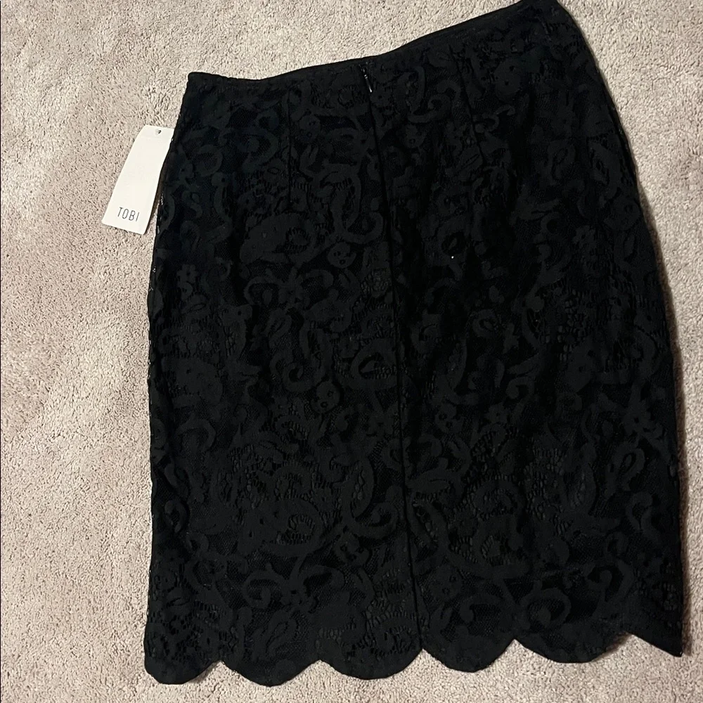 NWT size medium Tobi black lace high low skirt with